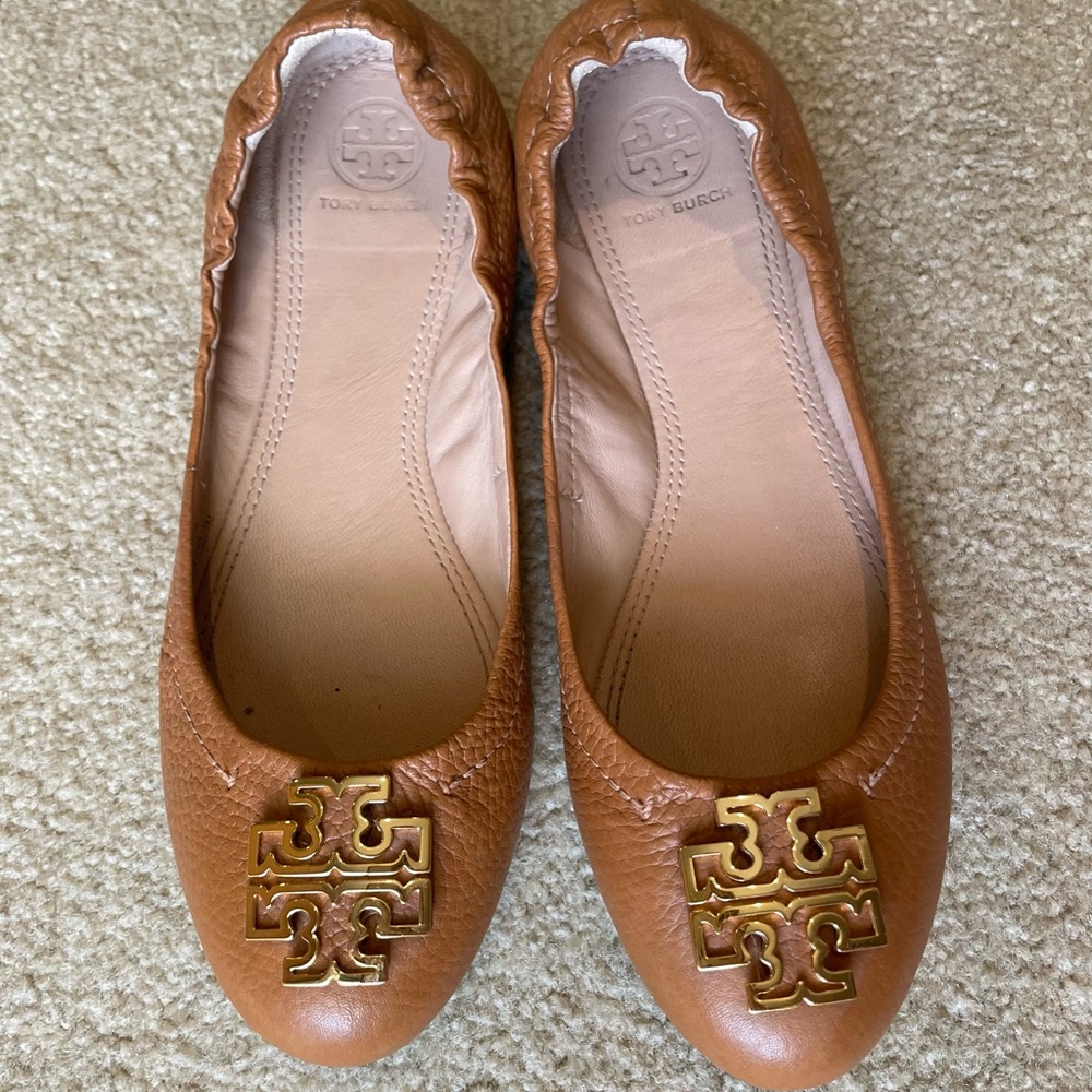 Tan and gold Tory Burch flats